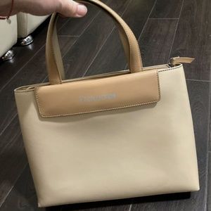 Elegant cream color faux fur purse- like new!